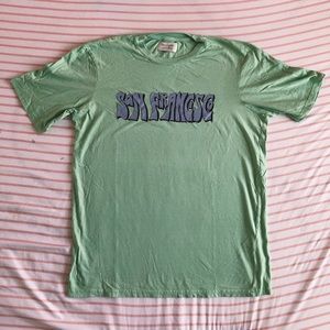 green graphic tee